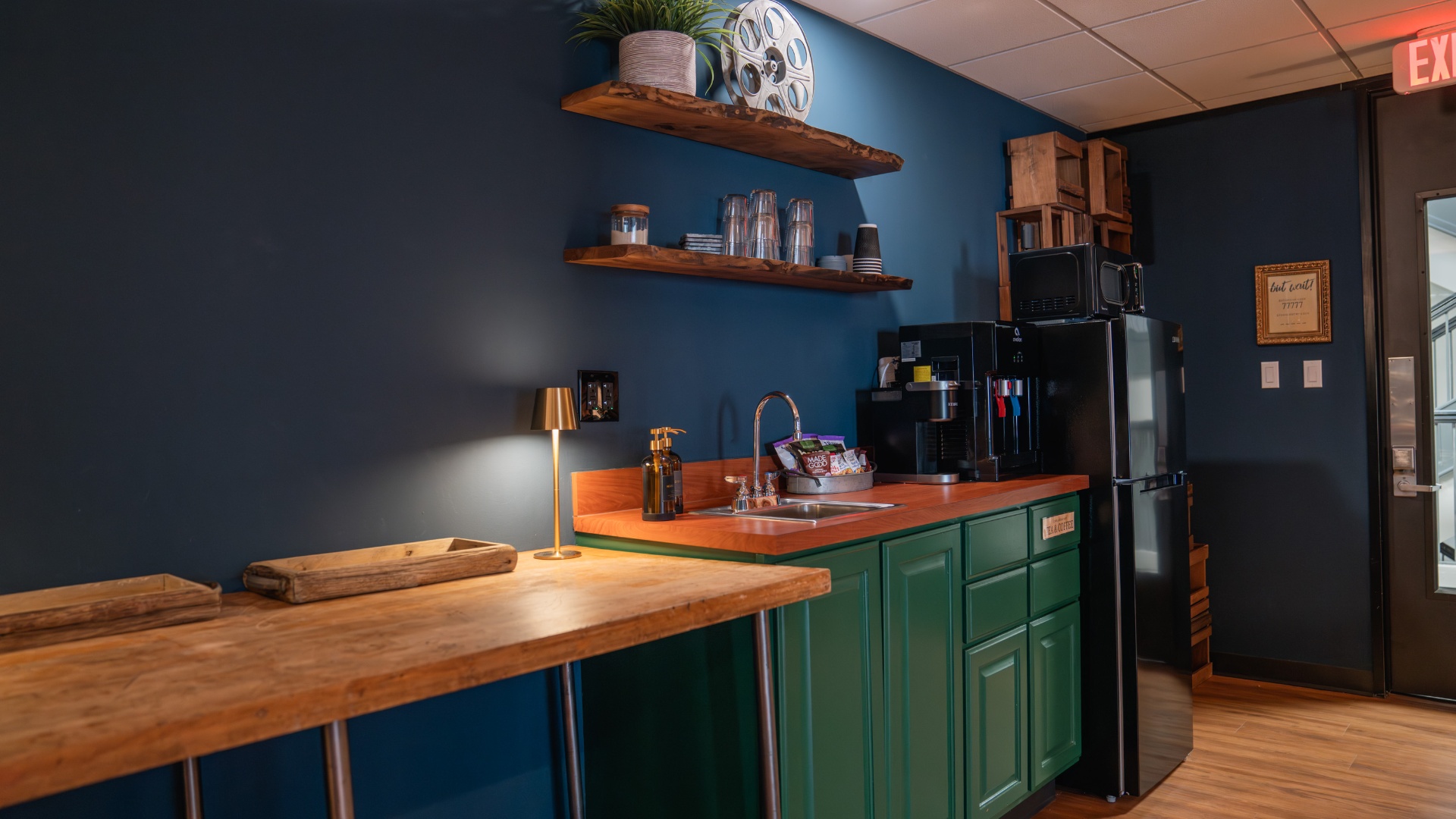 Hospitality kitchenette with coffee and fridge